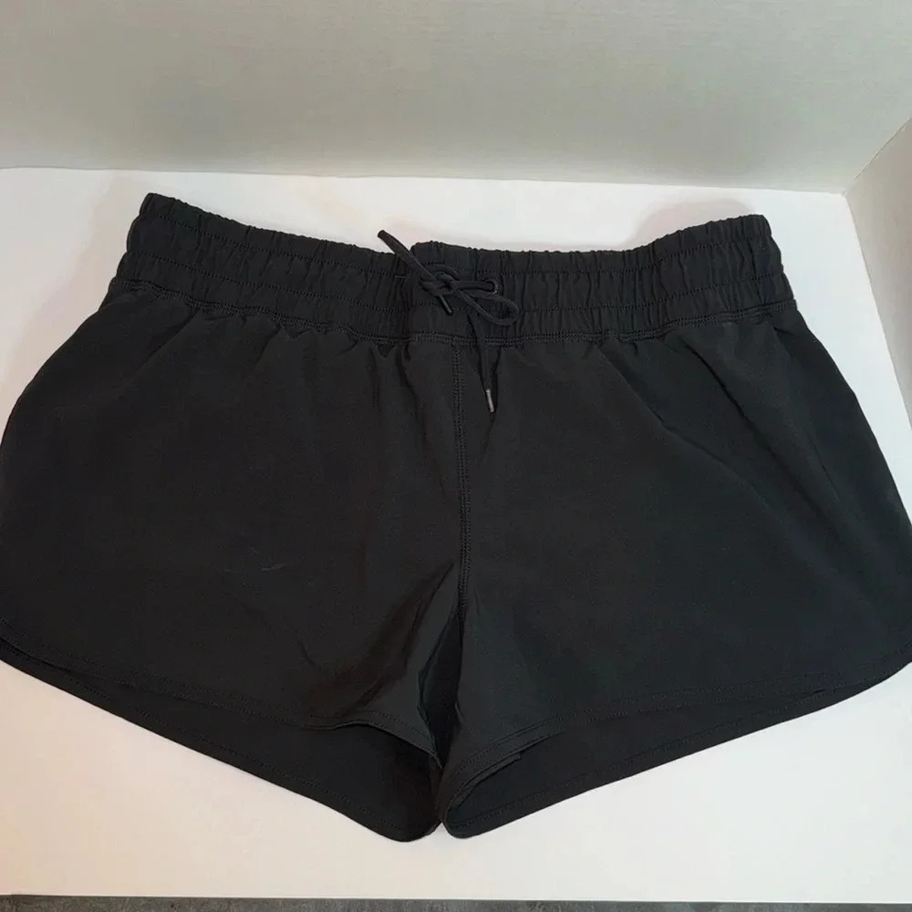 Lands’ End Sport Shorts with lining.